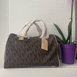 Micheal Kors LG satchel genuine leather